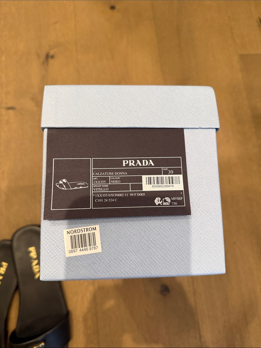 Prada Black Leather Logo Slide Sandals with Gold Accents - Picture 2 of 5